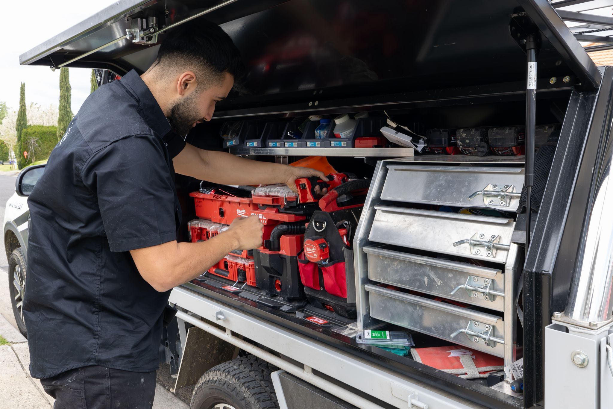Murat working from the fully stocked Mickey Plumbing ute